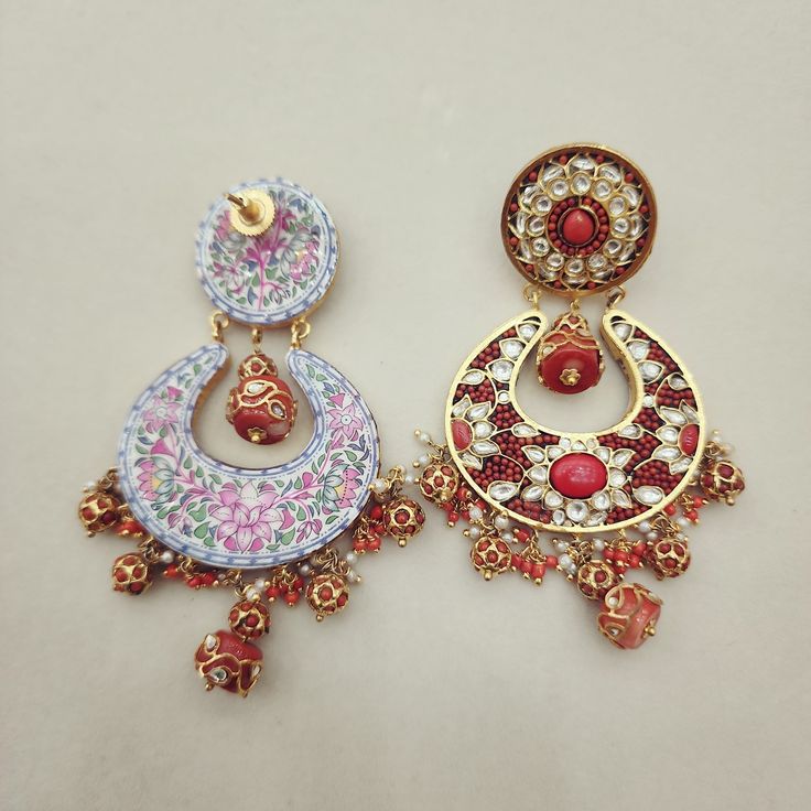 Enhance your look with these elegant Coral Chandbali Earrings. Featuring intricate designs with coral drops, these earrings bring a perfect blend of tradition and sophistication to any outfit. Ideal for festive occasions, they add a vibrant and graceful touch to your ensemble. Length: 3" to 3.5" Material: 24Kt gold foil, lac Stones: Kundans, semi precious corals, semi precious pearls Chandbali Earrings, Coral Flowers, Pin Pendant, 24kt Gold, Pendant Rings, Intricate Designs, Natural Beads, Gold Foil, Necklaces Bracelets