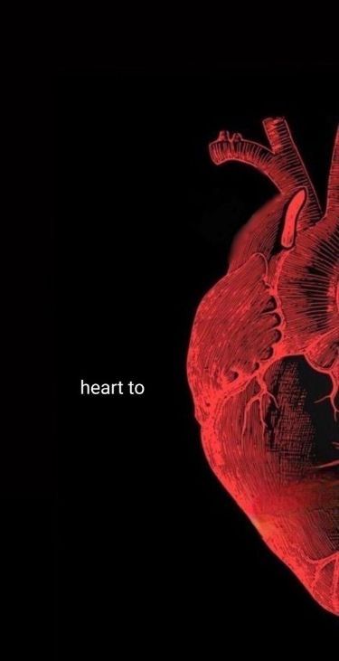 an image of a heart that is in the dark