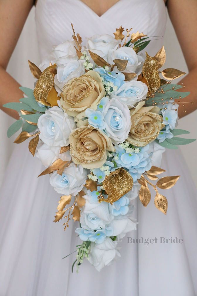 a bridal bouquet with gold and blue flowers