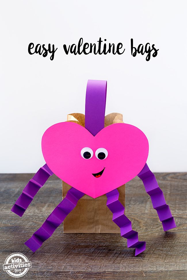 an easy valentine's day craft made out of paper with the words easy valentine bags