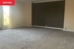 an empty living room with carpeted floor and large window in the background, before and after remodeling