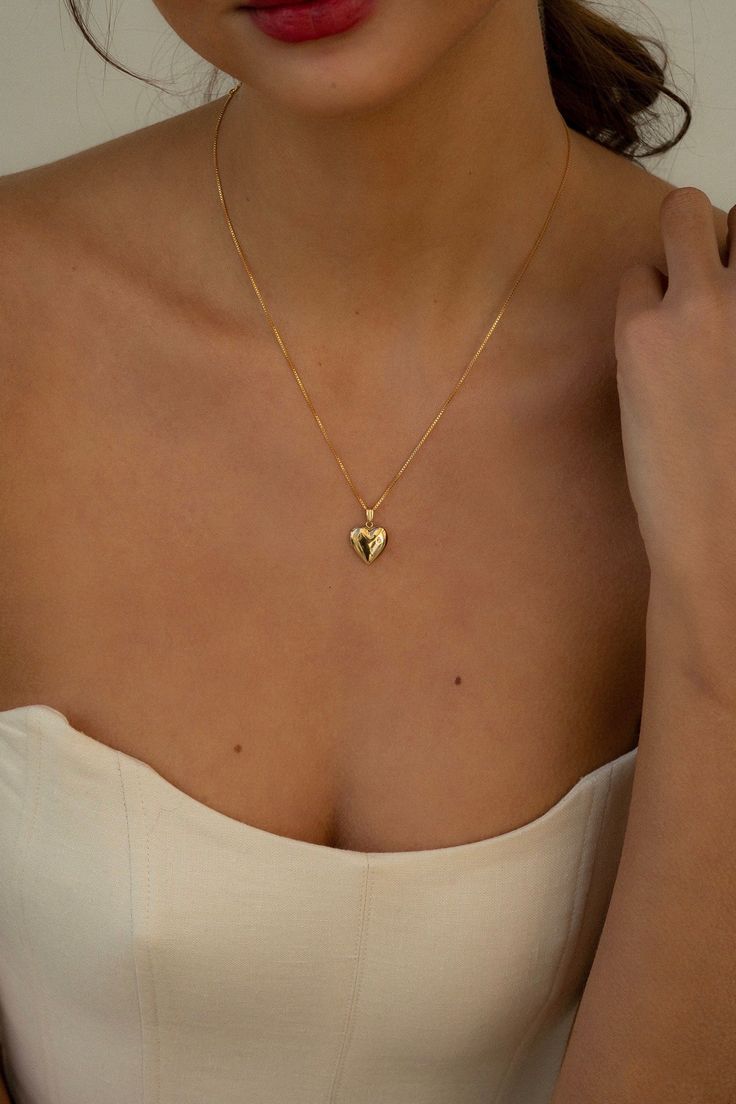 Wear your loved ones close to your heart in a locket suspended by a delicate 14k adjustable gold-filled chain.  Choose from 3 different locket sizes. Engraving or photo possible with an additional fee, 8-12 day send out time with customization. Please leave a note upon checkout or reach out to us at contact@katyfaye.co Locket Necklace Simple, Locket Necklace Gold Jewelry, Dainty Everyday Locket Necklace, Wedding Heart Pendant Gold Plated Locket Necklace, Everyday Heart Locket Necklace For Valentine's, Dainty 14k Gold Locket Necklace, 14k Gold Heart Pendant Locket Necklace, Dainty 14k Gold Pendant Locket Necklace, 14k Gold Heart Locket Necklace For Wedding