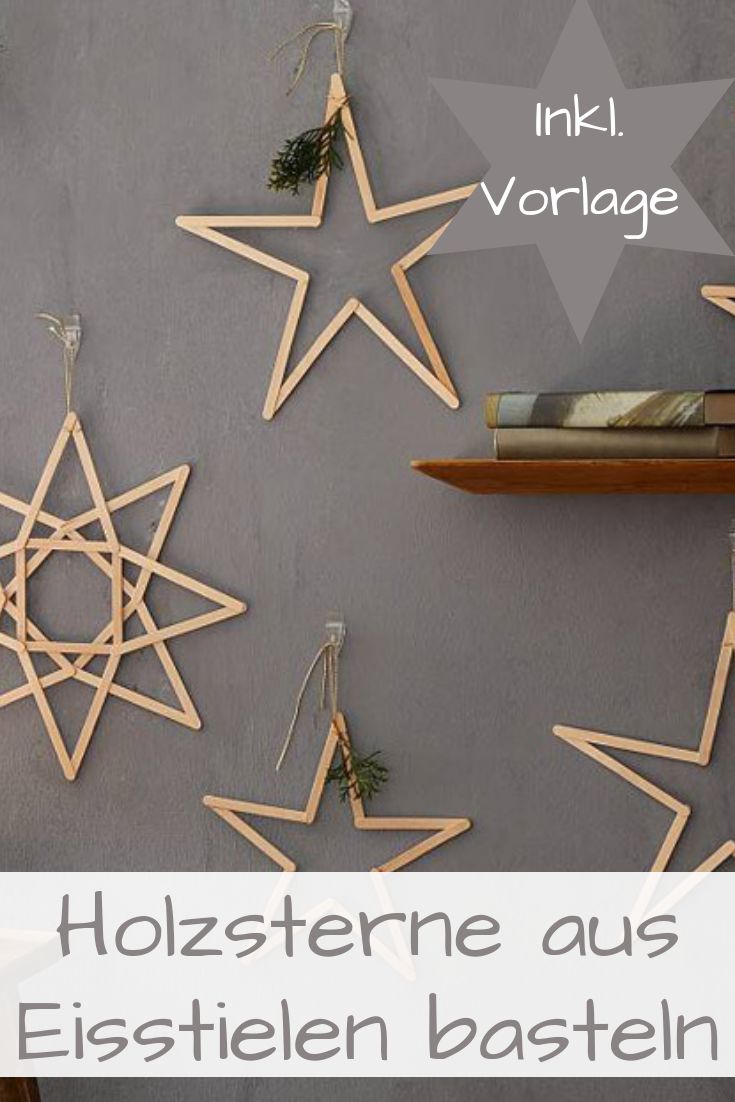 several wooden stars hanging on the wall