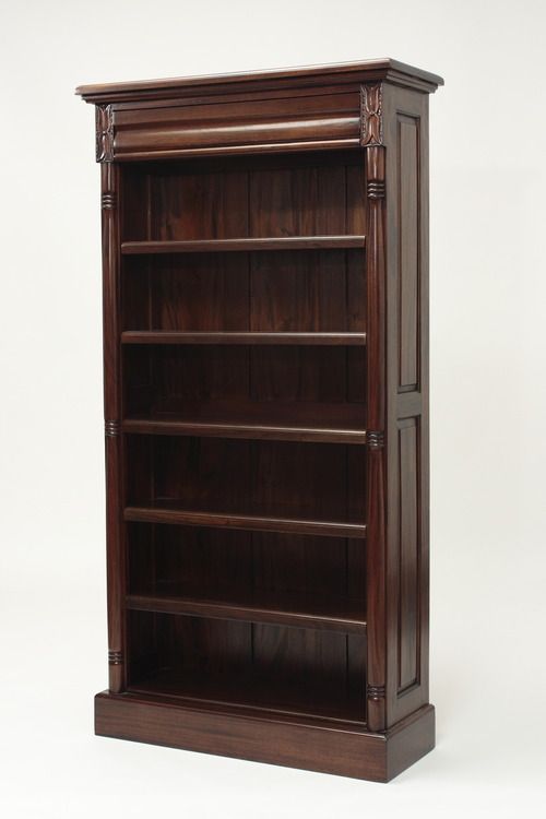 a wooden bookcase with three shelves on each side