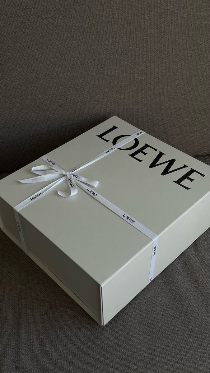 a white box with a bow tied around it