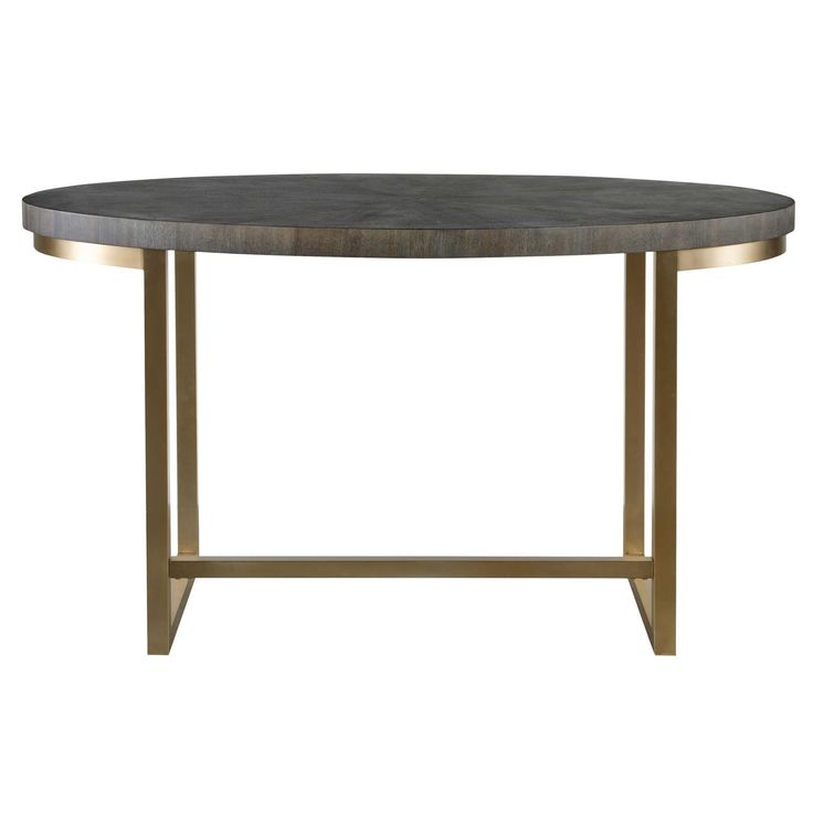 an oval table with gold legs and a black marble top, against a white background