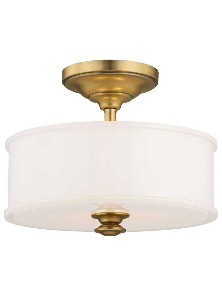 a ceiling light with a white shade on it