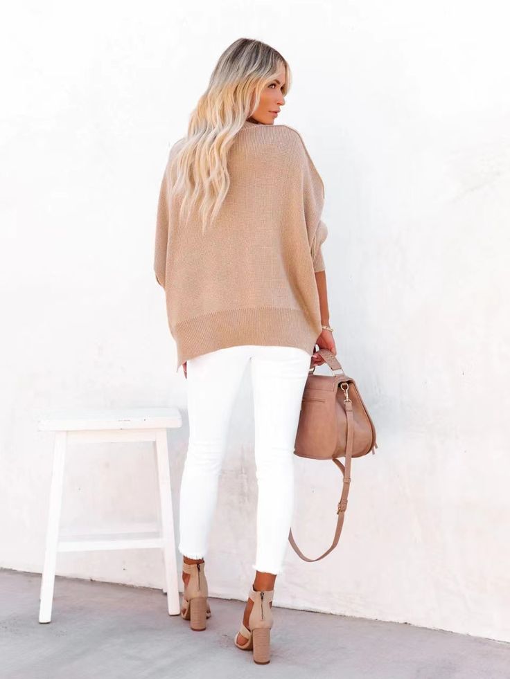 Update your knitwear collection with this oversized sweater boasting a relaxed silhouette and a neutral khaki tone. Size Guide: Model is 5’6” tall, and has a 33.5” bust, 24.8”waist, & 37.4” hips. She is wearing a S / US 4 / AU 8. This sweater is true to size. Material: 100% acrylic. Care Instructions: Machine wash / Cold hand wash