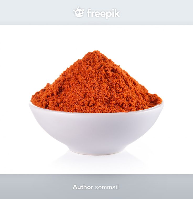 a white bowl filled with red powder