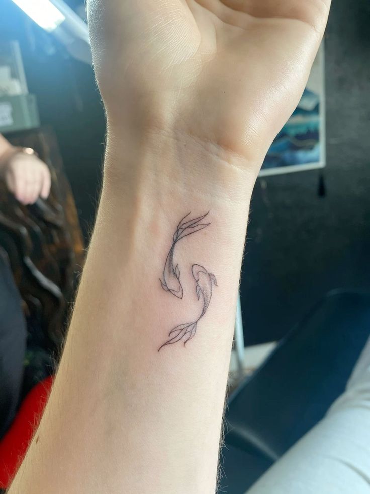 Small Tattoo Pisces, Fine Line Coy Fish Tattoo, Fine Line Goldfish Tattoo, Montell Fish Tattoo, Pisces And Virgo Tattoo Combined, Pisces Tattoo Fine Line, Beta Fish Tattoo Jjk, Pisces Fine Line Tattoo, Fish Ankle Tattoo