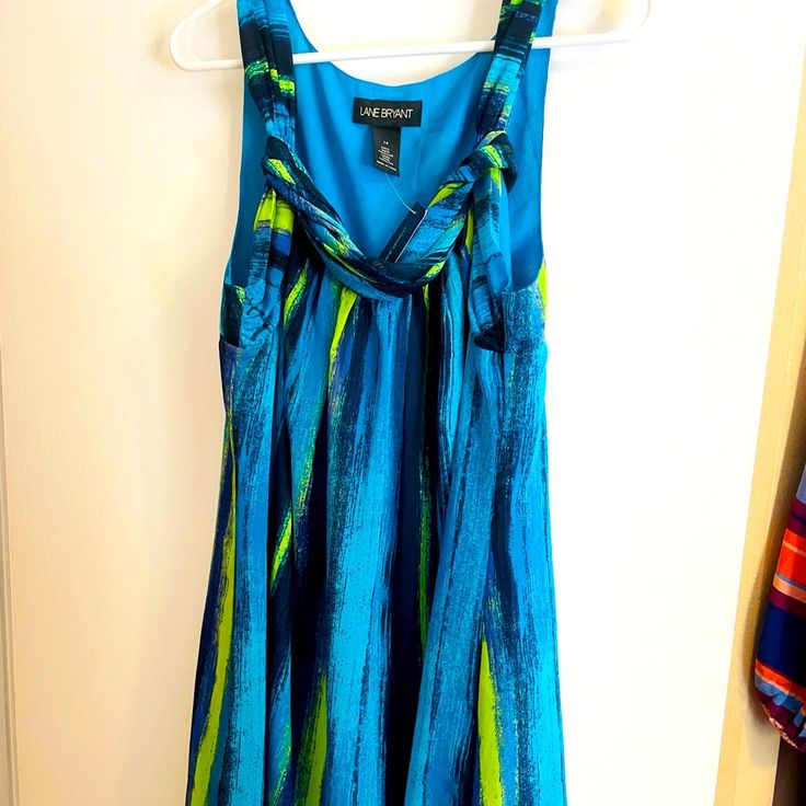 Really Cute Bright Tunic Top Or Short Dress. Nwt Lined Underneath. Length 33 Inches Waist 21” Hips 24” Armpit To Armpit 22” Polyester Material Sleeveless Blue Lined Sundress, Blue Flowy Sleeveless Dresses, Blue Sleeveless Lined Sundress, Blue Flowy Sleeveless Sundress, Flowy Blue Sleeveless Sundress, Blue Flowy Sleeveless Mini Dress, Forever 21 Blue Sleeveless Mini Dress, Mini Tank Dress, Lane Bryant