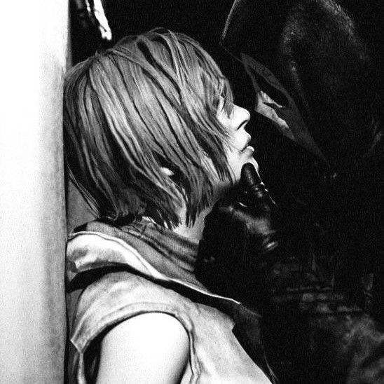 a black and white photo of a woman kissing a man