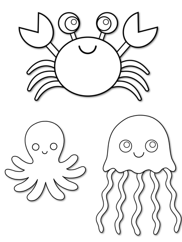 an octopus and crab cut out from paper