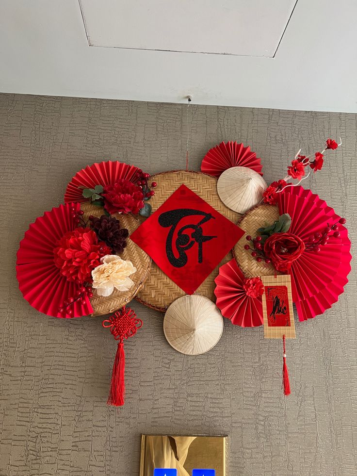 the table is decorated with red fan and decorations for chinese new year's eve