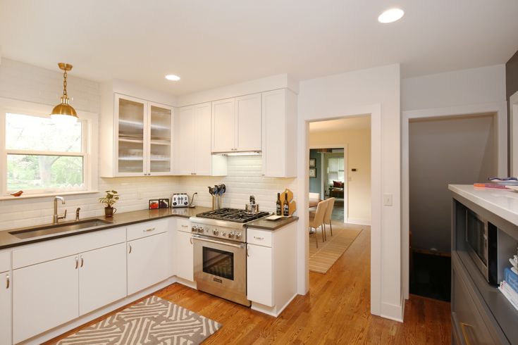 the kitchen is clean and ready for us to use in its new owner's home