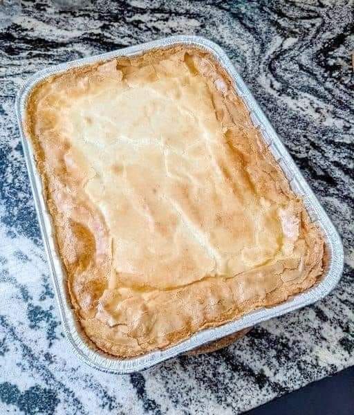 an uncooked pie sitting on top of a counter