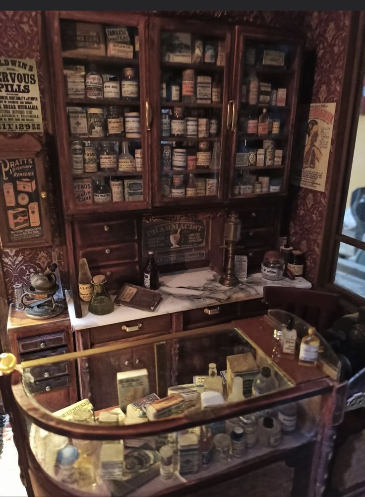 an old fashioned pharmacy cabinet filled with lots of medicine