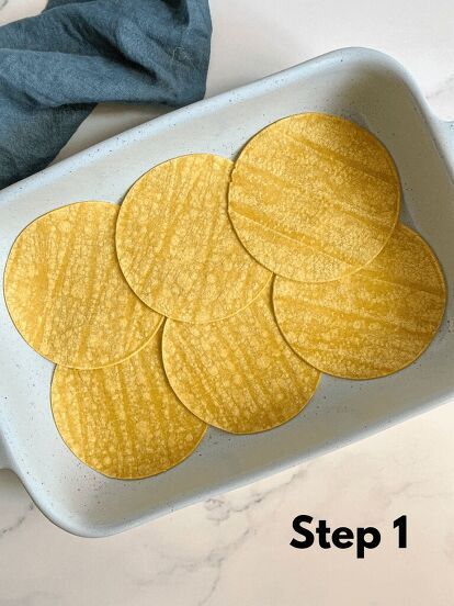 four slices of potato chips in a baking dish with the words step 1 on it