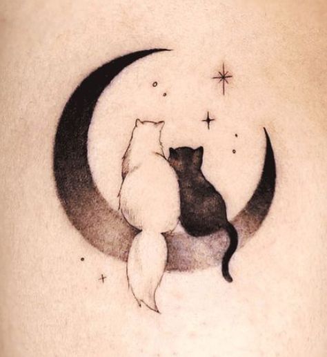 a black and white cat sitting on top of a crescent moon with stars in the sky