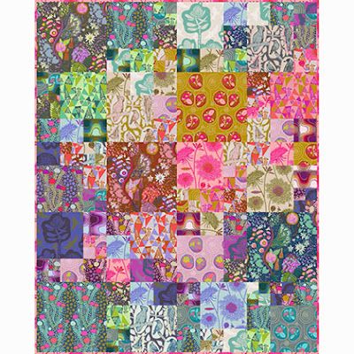 a colorful patchwork quilt with many different colors and designs on the front, including flowers