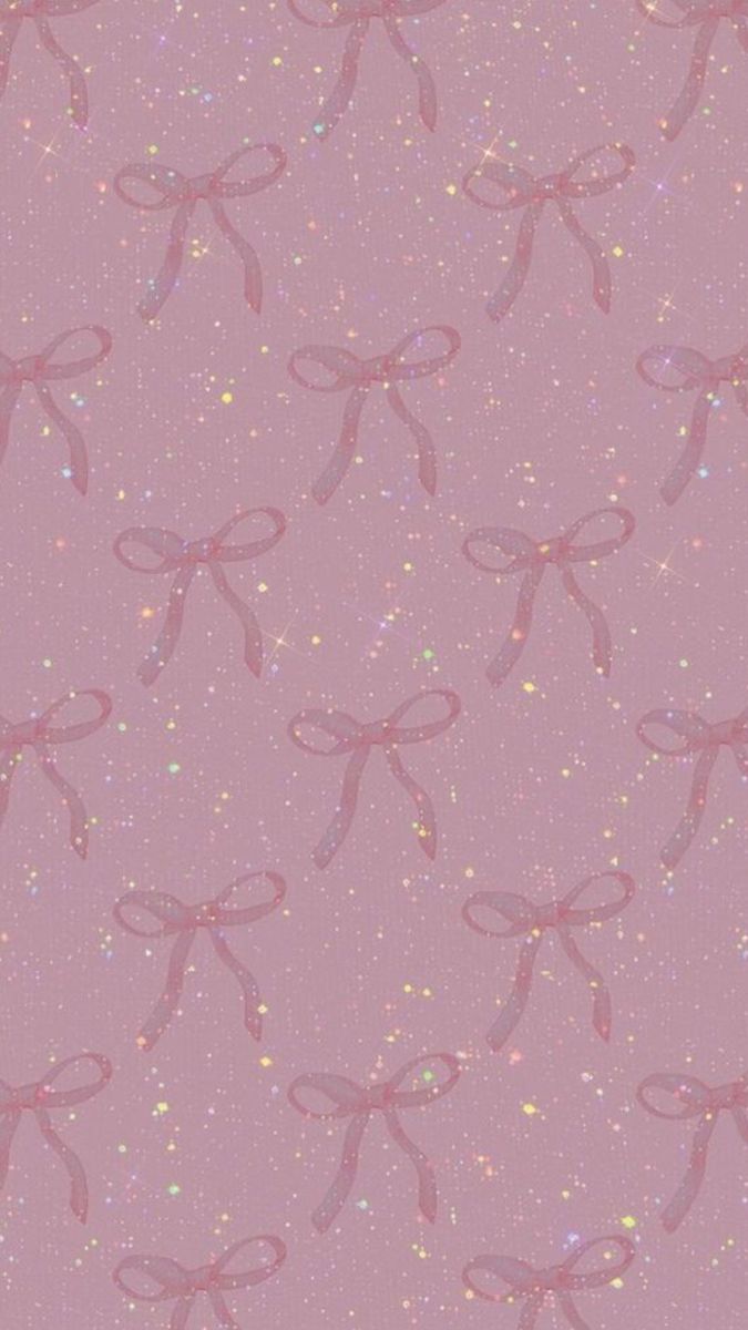 a pink background with glitter bows on it