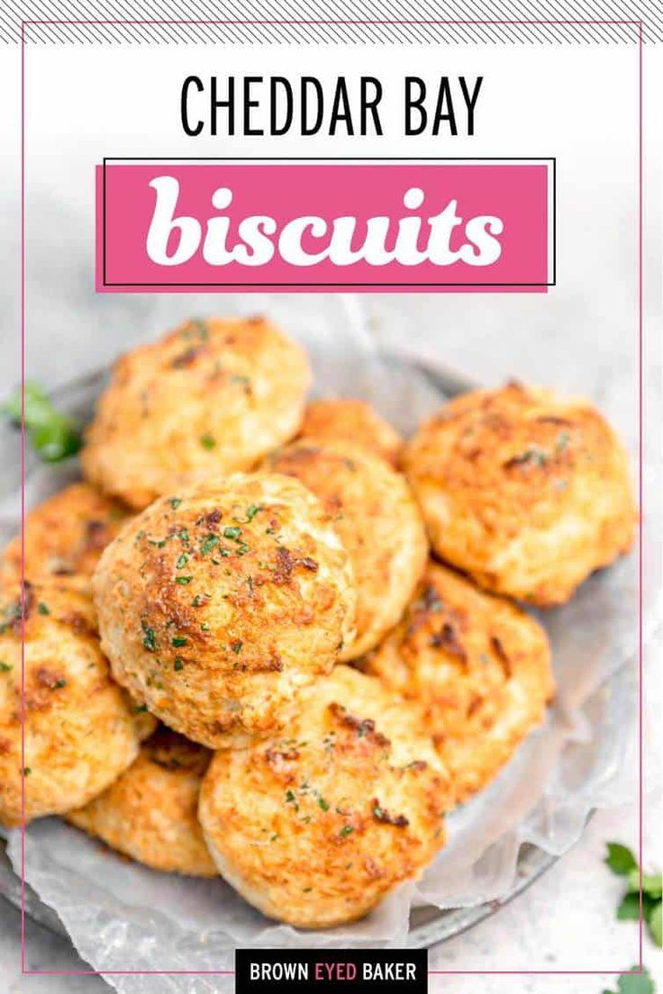 cheddar bay biscuits on a plate with text overlay