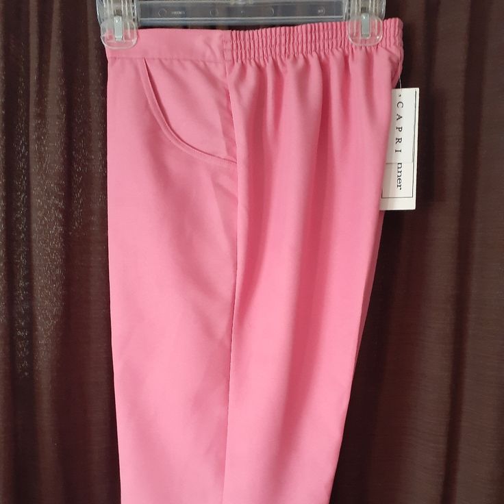 Alfred Dunner Capris Retails For $48 Spring Bermuda Stretch Pants, Knee-length Pink Bottoms For Workwear, Pink Capri Length Bottoms For Spring, Pink Knee-length Bottoms For Spring, Pink Knee-length Bottoms For Work, Fitted Short Length Capris With Pockets, Spring Capris With Pockets And Short Leg, Fitted Capris With Pockets, Pink Capri Bottoms For Spring