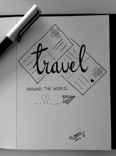 a piece of paper with the words travel around the world written on it next to a pen