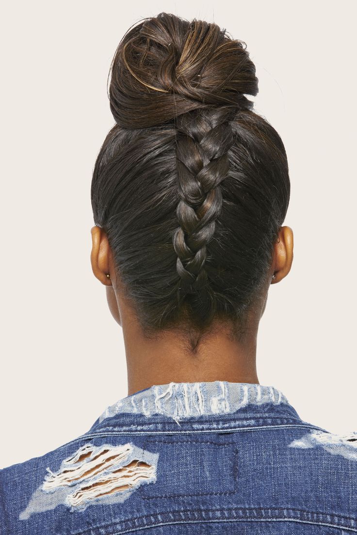 Up your top knot game with a back braid! Flip hair upside down and French braid the lower half of your hair in the back toward your crown, leaving out the front section. Once you reach the top of your head, gather the ends and the loose hair in front into a high pony. Secure with an elastic, then pin into a bun.   - Seventeen.com Braid In The Back Of Head, French Braid Top Knot, New Braided Hairstyles, Upside Down Braid, Braid Game, Medium Hair Braids, Braided Top Knots, Back Braid, Loose Braids