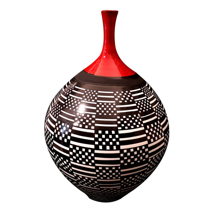 a black and white vase with red top sitting in front of a white background,