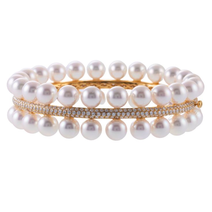 New without tags Assael Forever 18k gold pearl bangle, with 7.5-8mm Akoya cultured pearls and approx. 4.00ctw G/VS diamonds. Retail $25000. DESIGNER: Assael MATERIAL: 18k Gold GEMSTONES: Diamond, Pearl DIMENSIONS: Bracelet will fit approx. up to 7" wrist and is 19mm wide. WEIGHT: 46.2 grams MARKED/TESTED: Assael, 750. CONDITION: New/Store Sample Formal Round Diamond Pearl Bracelet, Formal Diamond Pearl Bracelet With Jubilee Style, Luxury White Gold Akoya Pearl Bracelets, Luxury Akoya Pearl Bracelet In White Gold, Luxury White Gold Akoya Pearl Bracelet, Luxury Akoya Pearl White Gold Bracelet, Fine Jewelry Diamond Pearl Bracelet For Wedding, Wedding Diamond Pearl Bracelet In Fine Jewelry Style, Fine Jewelry Pearl Bracelet For Anniversary