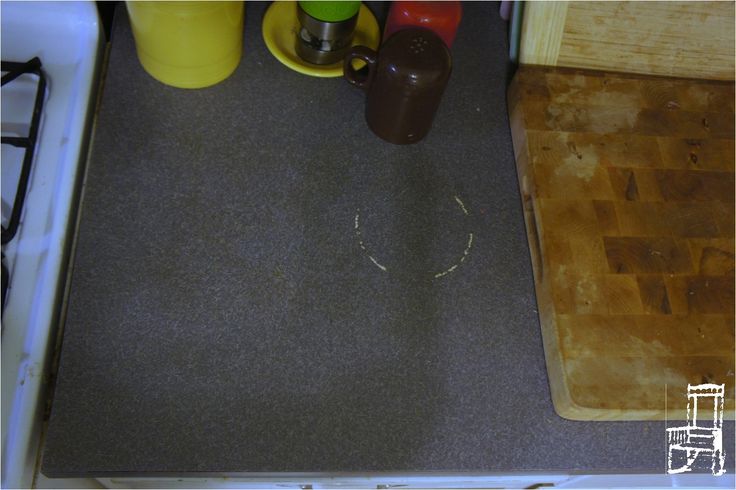 the kitchen floor is dirty and needs to be cleaned