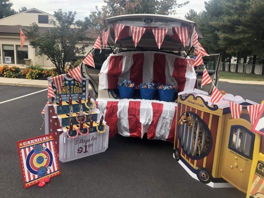 the back of a vehicle decorated with american flags and decorations