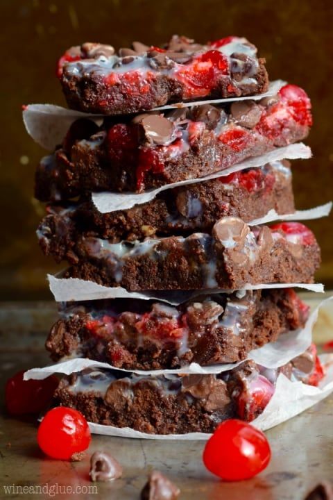 chocolate cherry brownies stacked on top of each other