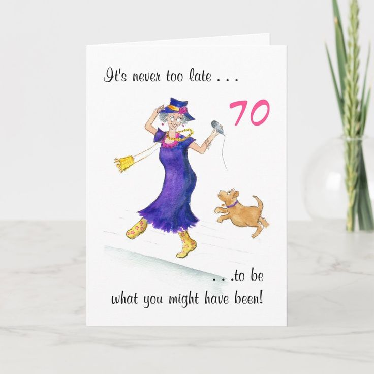 a birthday card with an image of a woman and her dog on the front, says it's never too late to be what you might have been