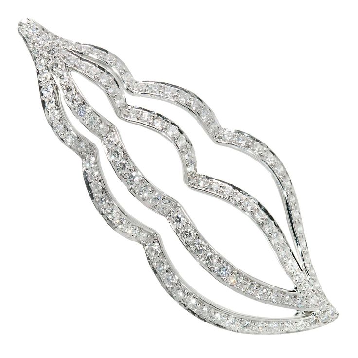 Tiffany & Co Platinum Diamond Shell Brooch. 119 round diamonds set in Platinum. 119 round diamonds full cut F VS Approx. total weight 2.00 cts Platinum Tested: Platinum Stamped: Pt 950 Hallmark: c 2004 Tiffany & Co Top to Bottom: 56.88mm or 2.24 inches Width: 22.64mm or .89 inches Depth or Thickness: 5.13mm 10.8 Grams Tiffany And Co Diamond, Whelk Shell, Tiffany And Co Jewelry, Vs1 Diamond, Round Diamond Setting, Platinum Jewelry, Diamond Brooch, Baguette Cut Diamond, Tiffany And Co