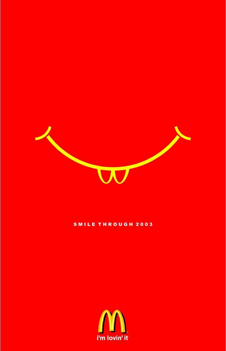 a mcdonald's advertisement with a smiley face drawn on the front and bottom half