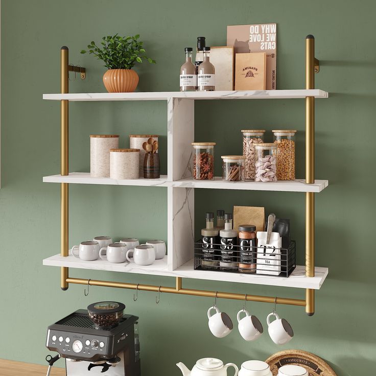 the shelves are filled with coffee cups, tea pots and other kitchen items on them