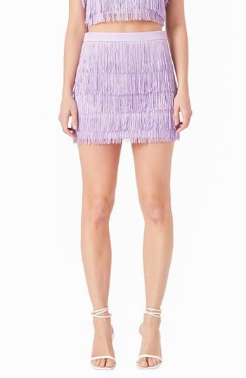 Fabulous fringe that sways with every step is tiered to perfection on this chic, dance floor–ready miniskirt. Hidden side-zip closure Lined 100% polyester Hand wash, dry flat Imported Spring Party Skirt With Mini Hem, Spring Party Mini Hem Skirt, Glamorous Spring Ruffled Skirt, Flirty Mini Hem Skirt For Party, Flirty Mini Hem Party Skirt, Spring Party Skort With Mini Hem, Spring Mini Bottoms For Party, Chic Tassel Mini Skirt, Chic Skirt With Tassels For Spring