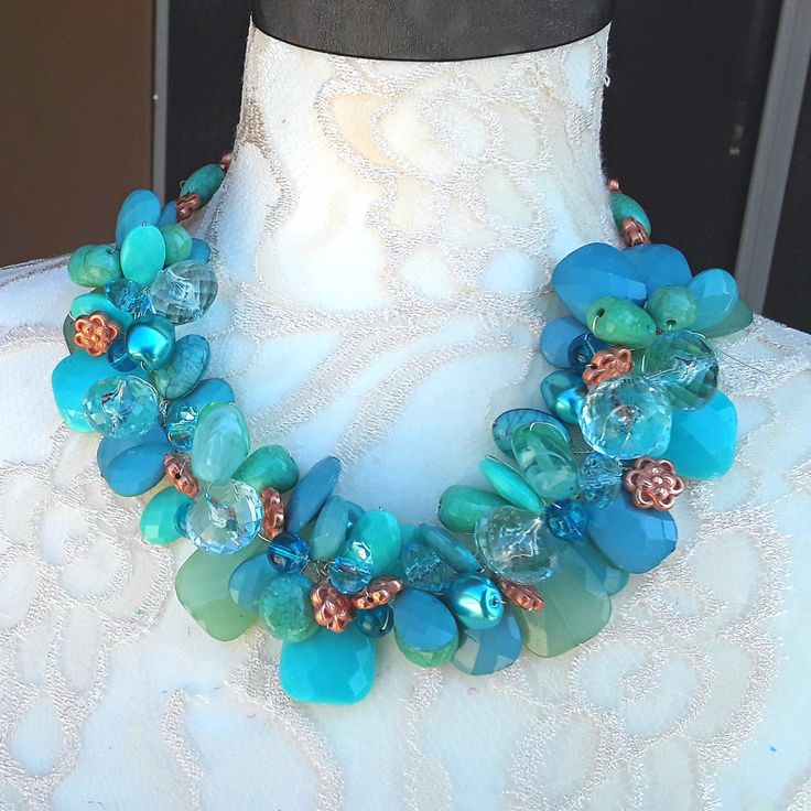 I got the inspiration for this collar from a picture of Princess Sophia wearing a Famous Designer Necklace. Instead of the Classic Pearls I chose to make it with large acrylic beads and other turquoise beads that provide drama but no WEIGHT! I also used copper glass beads. It makes a very bold statement. Measures - You Choose. It has a lovely magnetic clasp for easy attachment.. Get ready for compliments!!! This necklace has The Iris Apfel Wow Factor for sure! Free US Shipping! Are you ready for Bulky Necklaces, Beaded Baubles, Bridal Statement Necklace, Princess Sophia, Turquoise Statement Necklace, Birthday Party Centerpieces, Flower Statement Necklace, Twisted Sister, Necklace Colorful