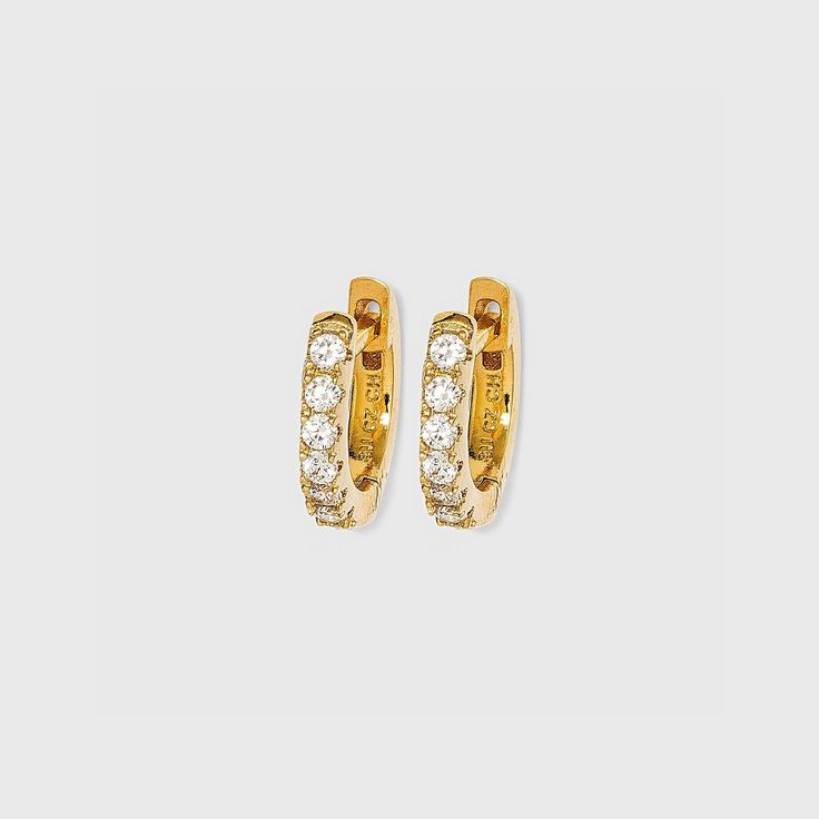 The 14K Gold Plated Cubic Zirconia Huggie Hoop Earrings from A New Day™ are the perfect way to give your favorite outfits a little extra something. These lovely earrings are made out of 14K gold-plated, nickel-free metal and feature cubic zirconia stone details that add a lovely touch to your looks. Plus, the clip-in closure style helps keep them in place as you go about your day. A New Day™: Style that goes wherever you do. Gender: unisex. Age Group: adult. Target Style, Lovely Earrings, Huggie Hoop Earrings, Fashion Help, A New Day, New Day, Favorite Outfit, Cubic Zirconia, Age Group