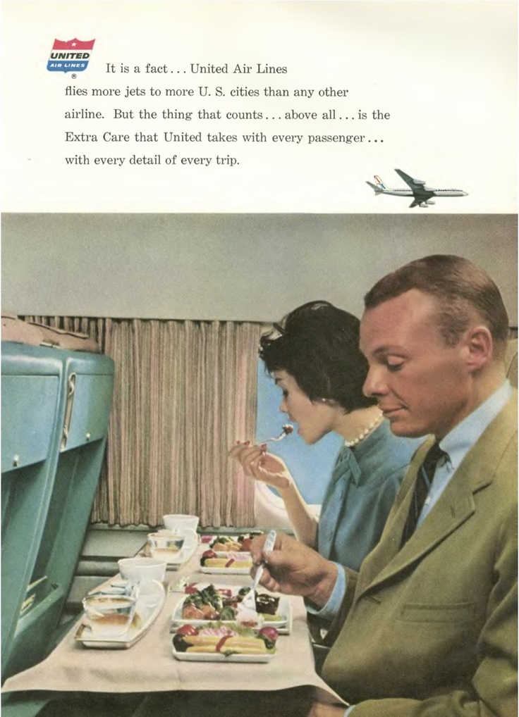 an old advertisement for air lines shows two people eating at a table with food in front of them