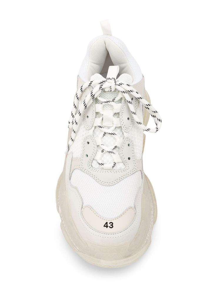 White leather Triple S bubble sneakers from Balenciaga featuring a front lace up detail, a cushioned air sole, branded detailing to the sides, a pull tab at the rear and three layered soles. | Balenciaga Triple S bubble sneakers Designer White Low-top Platform Sneakers, Custom Streetwear Sneakers With Medium Fit, Custom Sneakers For Streetwear With Medium Fit, White Medium Fit Lace-up Sneakers, Low-top Chunky Sneakers With Contrast Sole, Designer White Sneakers With Perforations, Mesh High-top Sneakers With Contrast Sole, Mesh High-top Sneakers With Textured Sole For Streetwear, White Mesh Sneakers With Textured Sole