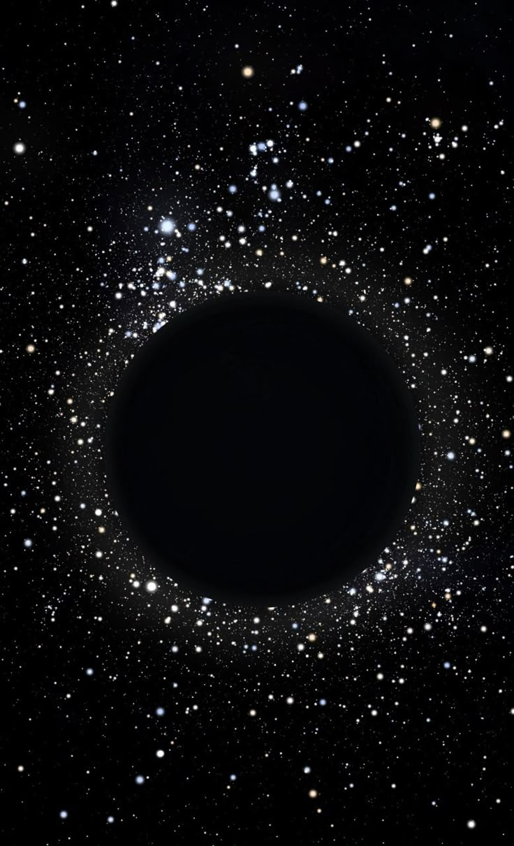 a black hole in the sky with stars around it