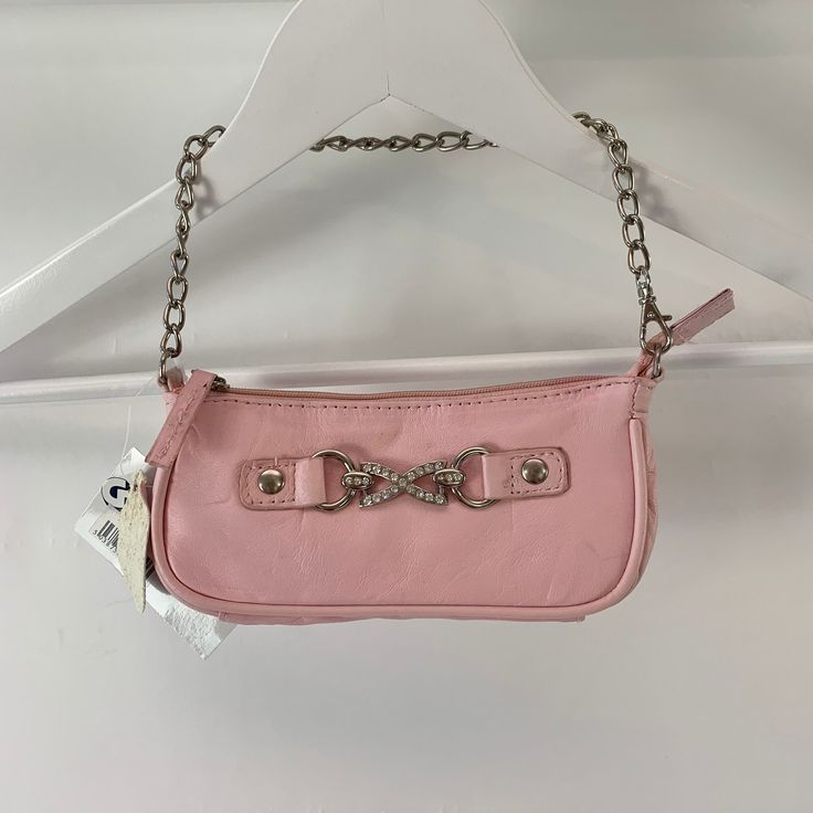 00s pink mini bag Measures 3 by 7 inches Deadstock from 00s Has one compartment that closes with a zip Super cute design Genuine leather Message with any questions -Lucy at RARIFY (1B) @chinamonroe (Insta) with her 00s Rarify bag in final photos Y2k Style Pink Bag For Everyday Use, Y2k Style Pink Rectangular Bag, Pink Y2k Bag For Everyday Use, Pink Y2k Shoulder Bag For Daily Use, Pink Rectangular Y2k Bag, Pink Y2k Rectangular Bag, Y2k Pink Rectangular Bag, Y2k Pink Shoulder Bag, Ralph Lauren Jumper