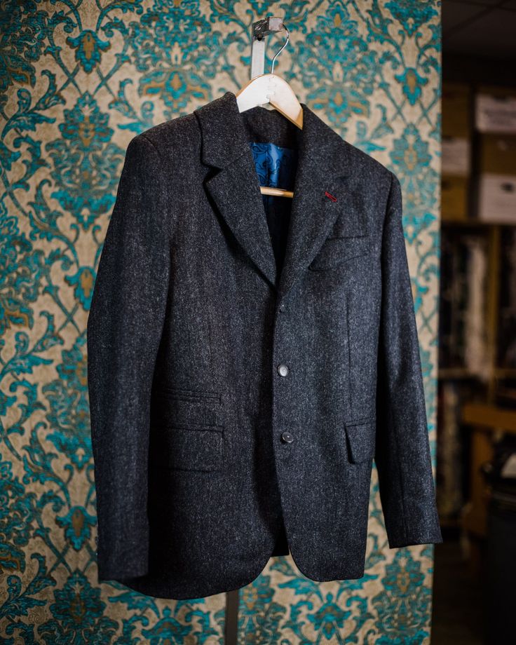 "ABOUT THIS STYLE: A three button jacket with a high break point, a 1920s style swoosh breast pocket and butcher's buttons made from beautiful buffalo horn.  A classic pleated pant with a tapered leg and a watch pocket. This style features handmade Milanese style silk buttonholes. Classic flap pockets and a piping ticket pocket complete the look. English woven Shetland tweed from Yorkshire.  A robust fabric that is just the same as it would have been in the 19th and early 20th century.  Woven to last a lifetime with an incredible richness of color in the weave.   Edwardian, vintage style, retro----this style has a wealth of the amazing classic details that are rarely seen on store bought menswear: As always, a client can choose every detail from dozens of cuff styles to the placket shape a Classic Black Tweed Jacket With Button Closure, Timeless Tweed Suit With Welt Pockets, Tweed Three-piece Suit With Notch Lapel For Work, Classic Semi-formal Tweed Jacket With Welt Pockets, Tailored Timeless Tweed Jacket With Pockets, Classic Black Tweed Jacket With Buttons, Classic Tweed Suits With Suit Collar, Winter Tweed Three-piece Suit For Work, Fall Single Button Three-piece Suit For Work