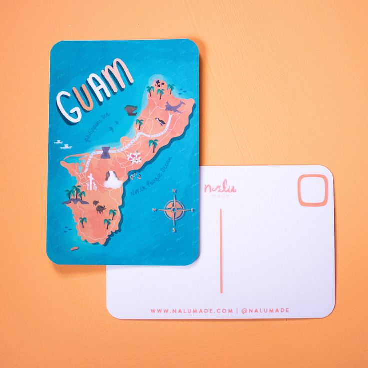 a card with the map of gumm on it next to a notepad that says gumm