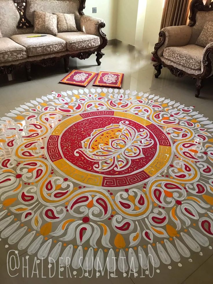 an intricately designed carpet in the middle of a living room