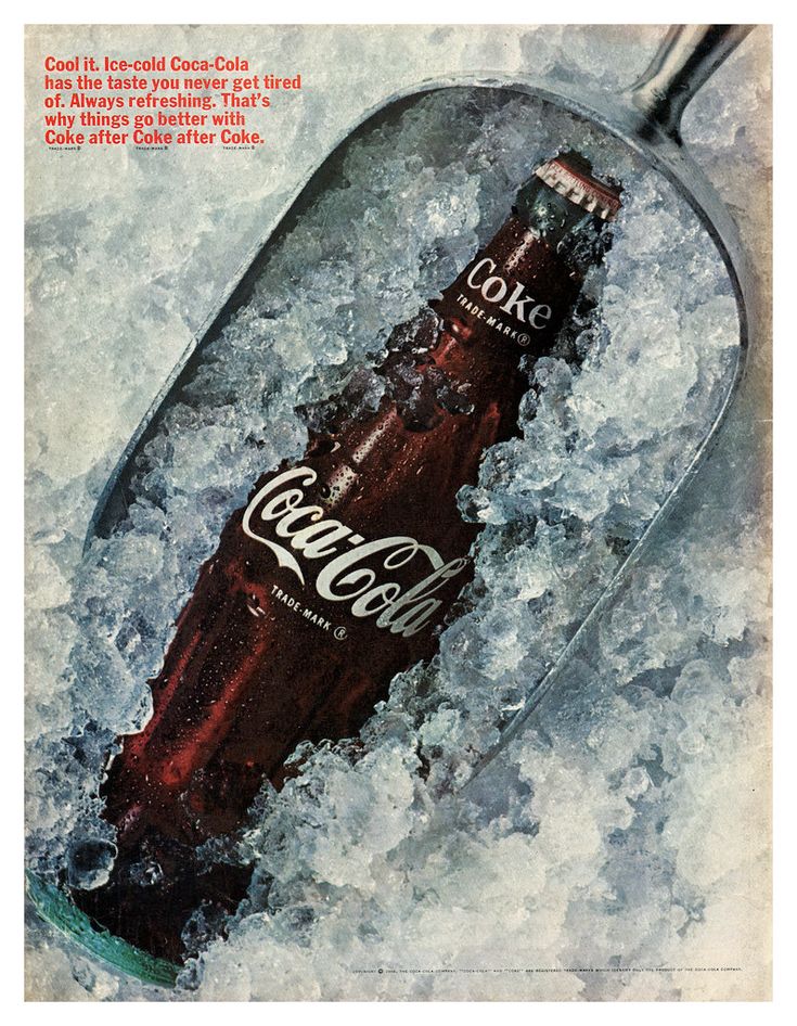 an old coca cola bottle in the ice