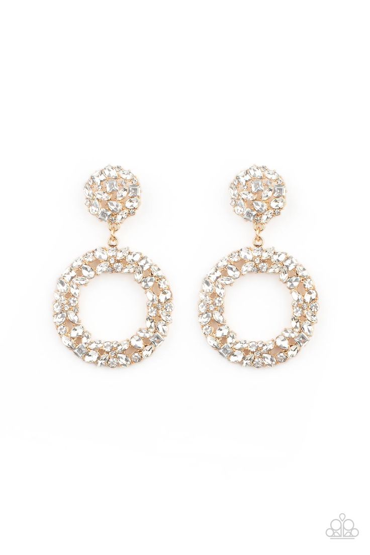 A sparkly wreath of marquise, square, teardrop, and classic white rhinestones delicately swings from the bottom of a matching round golden frame, creating a dramatically dazzling statement piece. Earring attaches to a standard post fitting. Sold as one pair of post earrings. Glamorous Diamond White Bridal Earrings For Party, Glamorous Diamond White Bridal Earrings, Elegant Jeweled Hoop Jewelry, Glamorous Diamond White Earrings For Party, White Dazzling Crystal Earrings For Party, Dazzling White Crystal Earrings For Party, Elegant Jeweled Hoop Earrings, Elegant Jeweled Round Hoop Earrings, Glamorous Bridal Earrings With Diamond Accents For Party